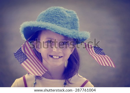 Detail portrait of girl with patriotic flags instagram style