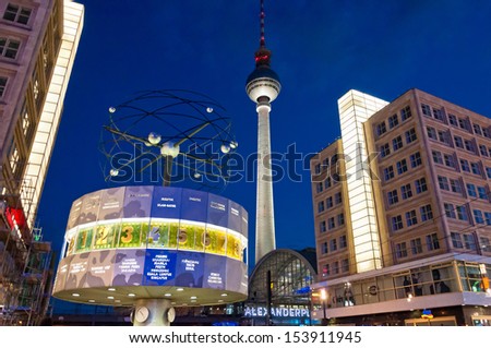 BERLIN, GERMANY - JUNE 07: Alexanderplatz, Tv tower and world clock night view on June 07, 2013 in Berlin. Called by Berliners simply Alex it is a large public square in Mitte district in Berlin.
