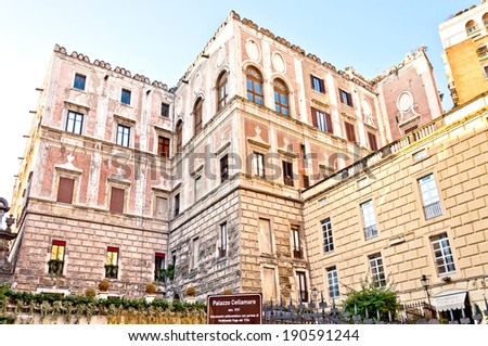 NAPLES, ITALY - JANUARY 1, 2014:  street view of famous Palazzo Cellamare in Naples, Italy. Naples\' historic city centre is the largest in Europe, and is listed by UNESCO as a World Heritage Site