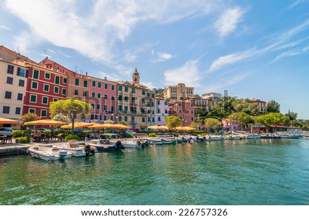 PORTO VENERE, ITALY - JULY 19, 2014: locals and tourists enjoy summer in Fezzano, Italy. Fezzano is located in La Spezia Gulf of Poets, Liguria, close to world famous Portovenere and Cinque Terre.