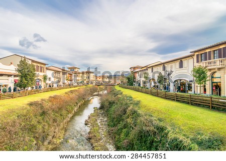 BARBERINO DI MUGELLO, ITALY - January 24, 2015: tourists shop at McArthurGlen Designer Outlet in Barberino di Mugello, Italy. Designer Outlet are located across Europe and offer discounts.