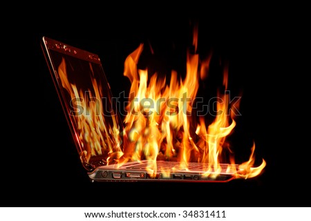 Image of laptop with fire burning from being over-used