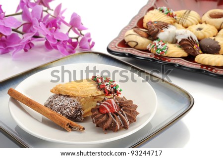 Close-up image of cookies and cinnamon stick