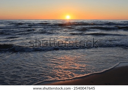 Similar – Image, Stock Photo sunset over the baltic sea, portrait of a young woman standing on the beach