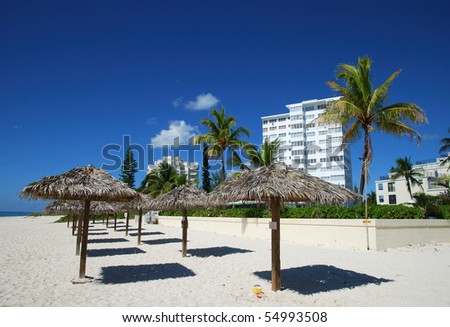 The resort buildings by the empty beach on Grand Bahama Island (The Bahamas).