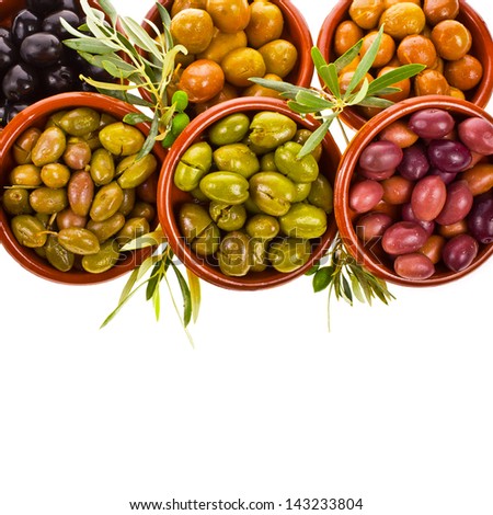 Similar – Image, Stock Photo Olives. A variety of green, black and red olives, with leaves, shot from the top with a place for text