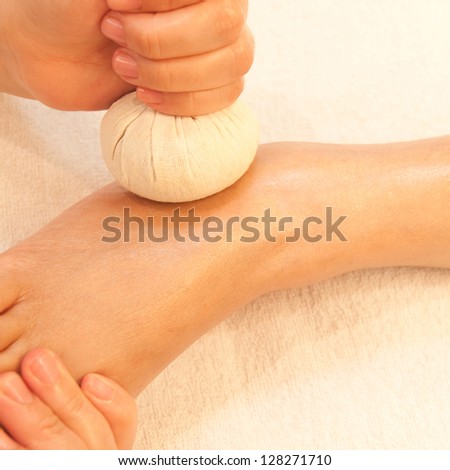 reflexology foot massage, spa foot treatment by ball herb,Thailand