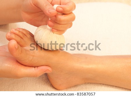 reflexology foot massage, spa foot treatment by ball herb,Thailand