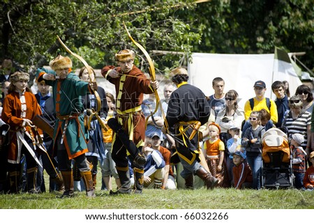CERVENY KAMEN, SLOVAKIA - MAY 22:   members of historical archery club shoot on target at \