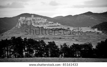 Dramatic picture of ancient Spis castle in black and white colors