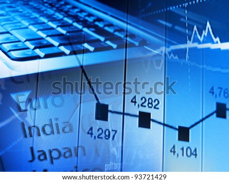 Finance background with finance data and laptop