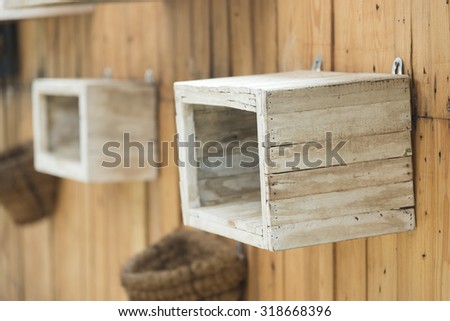 Wooden wall with wooden box