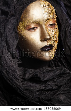 creative face art Matilda gold woman
