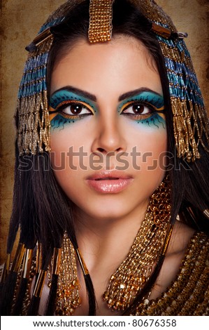 beautiful Egyptian woman like Cleopatra on egyptian background