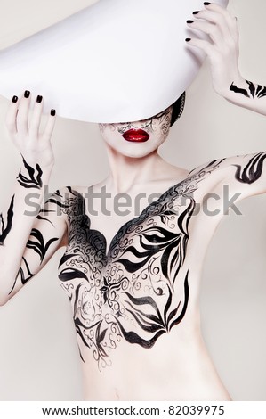 wonderful woman with body-art, model with white porcelain skin