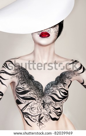 wonderful woman with body-art, model with white porcelain skin