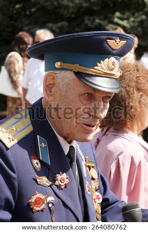 SLOVIANSK, UKRAINE - MAY 9, 2012: MAY 9: Unidentified Soviet Army veteran of World War II on Victory day in Sloviansk on May 9, 2012. Veteran reminisces about the past, in an interview