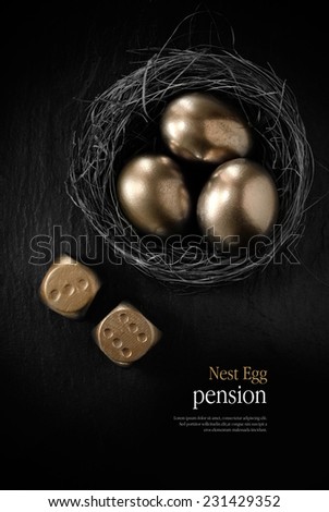 Creatively lit stylish concept image for pension nest egg or investment. Golden eggs placed in a birds nest with golden dice against black slate. Copy space.