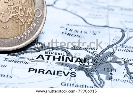 Athens and Euro coin Concept studio shot depicting current economic issues surrounding the Greek economy and the Euro