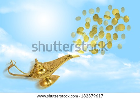 Money fly out of Aladdin\'s magic lamp. Business concept