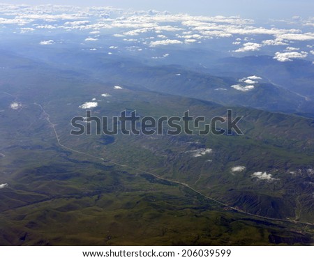 Mountains covered with trees. Top view. Natural landscape