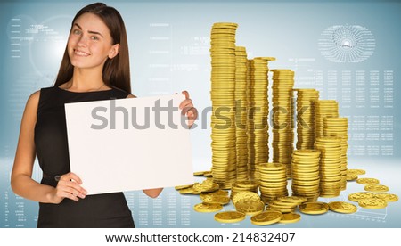 Business woman hold empty paper. Pyramid of gold coins