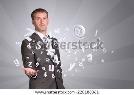 Businessman in suit hold empty hand with flying figures