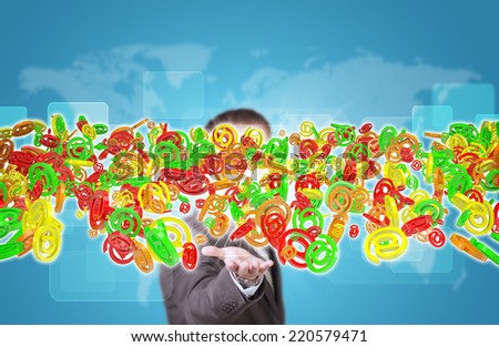 Businessman in suit hold flow of email symbols on background of world map and rectangles