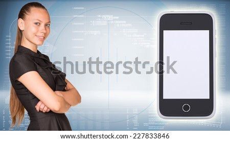 Beautiful businesswoman in dress smiling and looking at camera. Smart phone with empty screen are located near. Hi-tech graphs as backdrop