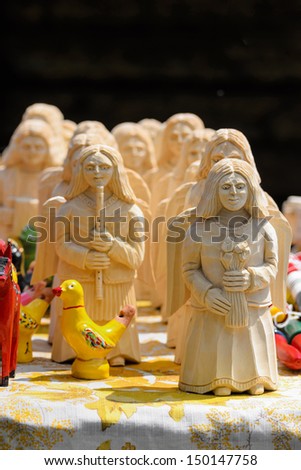CHORZOW,POLAND, JUNE 9: Handmade wooden sculptures on a market stall during a IV Convention of Christian Knighthood on June 9, 2013, in Chorzow