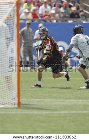 FOXBOROUGH - 28 MAY: Drew Snyder (23), University of Maryland, College Park, gets ready to take a shot at the NCAA Men's Division 1 Lacrosse Championship game in Foxborough, Massachusetts, 28 May 2012