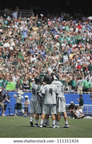 FOXBOROUGH - 28 MAY: Loyola University Maryland celebrates after a goal at the NCAA Men\'s Division 1 Lacrosse Championship game, 28 May 2012 in Foxborough, Massachusetts