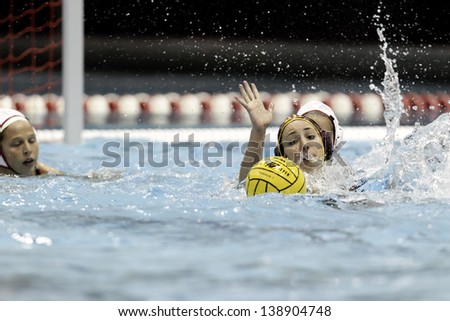 BOSTON - 12 MAY: Monica Vavic (6), University of Southern California, reaches for the ball at the NCAA Women\'s Division 1 championship Water Polo game in Boston, Massachusetts, 12 May 2013