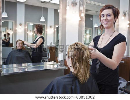 Woman getting a haircut at a beauty salon
