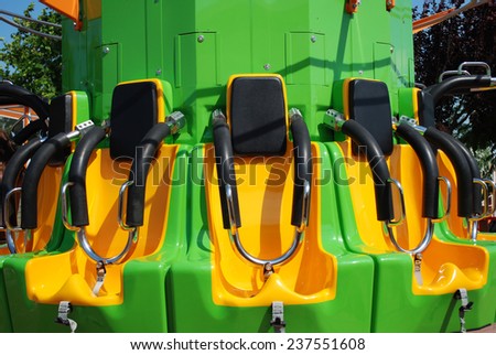 Seats of free fall tower in amusement park