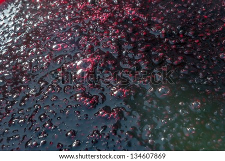 Cooking raspberry jam, ideal for backgrounds and textures