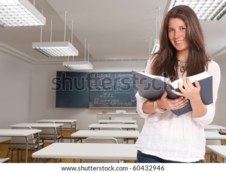 Cute young woman in a mathematics classroom