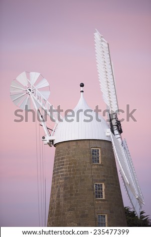 Detail image of Pink sky as twilight background at historic flour mill museum in Oatlands, Tasmania, still operating for agriculture industry.