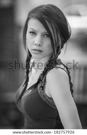 Black and white portrait of a young teen girl