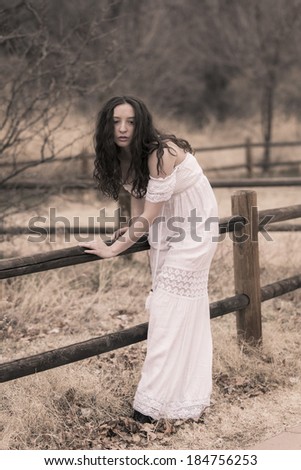 Crazy women posing outdoors in a white dress