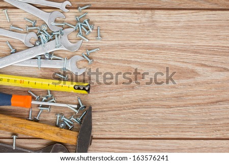 tools kit border on wooden  parquet planks with copy space