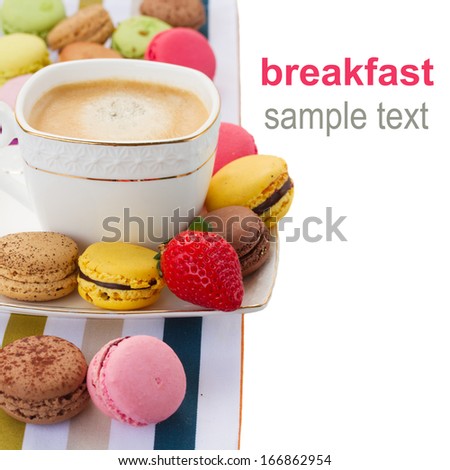 breakfast with macaroons  and coffee as a border isolated on white background
