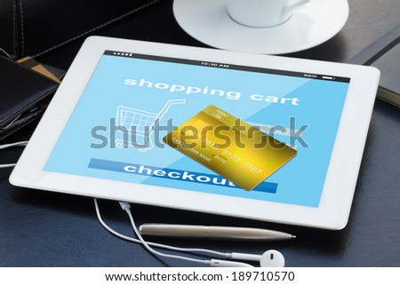mobile shopping concept  - checking out in virtual shop on tablet PC