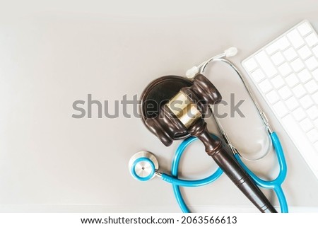 law gavel, stethoscope and face anti virus masks, medical law concept, copy space Stock foto © 