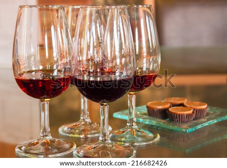 set of glasses of red ruby port wine