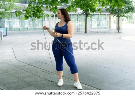 Similar – Image, Stock Photo Sportswoman with curvy body stretching leg on urban pavement