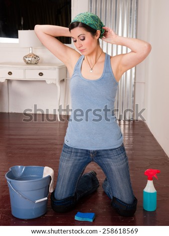 Blue Collar Worker Maid Doing Cleaning Chores Scrubbing Floor