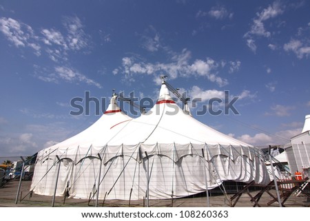 circus big top white with blue sky