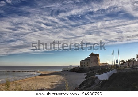 old castle by the sea with a beautiful sky
