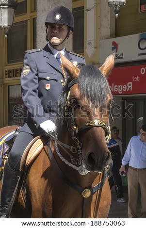 VALLADOLID, SPAIN - APRIL 17: Police on horseback during a procession of Holy Week celebrations of international interest April 17, 2014 in Valladolid Spain